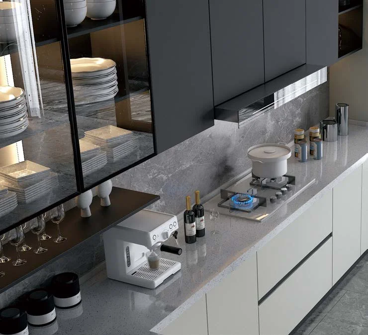 Close-up of kitchen cabinetry, stone surfaces and integrated storage